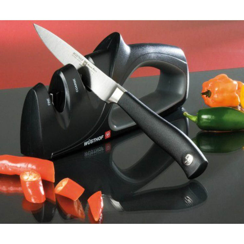 https://www.potterscookshop.co.uk/cdn/shop/files/3069730102-Wusthof-2-Stage-Hand-held-Knife-Sharpener-Lifestyle_800x.jpg?v=1702293459