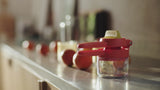 Joseph Joseph JuiceMax™ Dual-Action Citrus Press with Measuring Cup - Orange