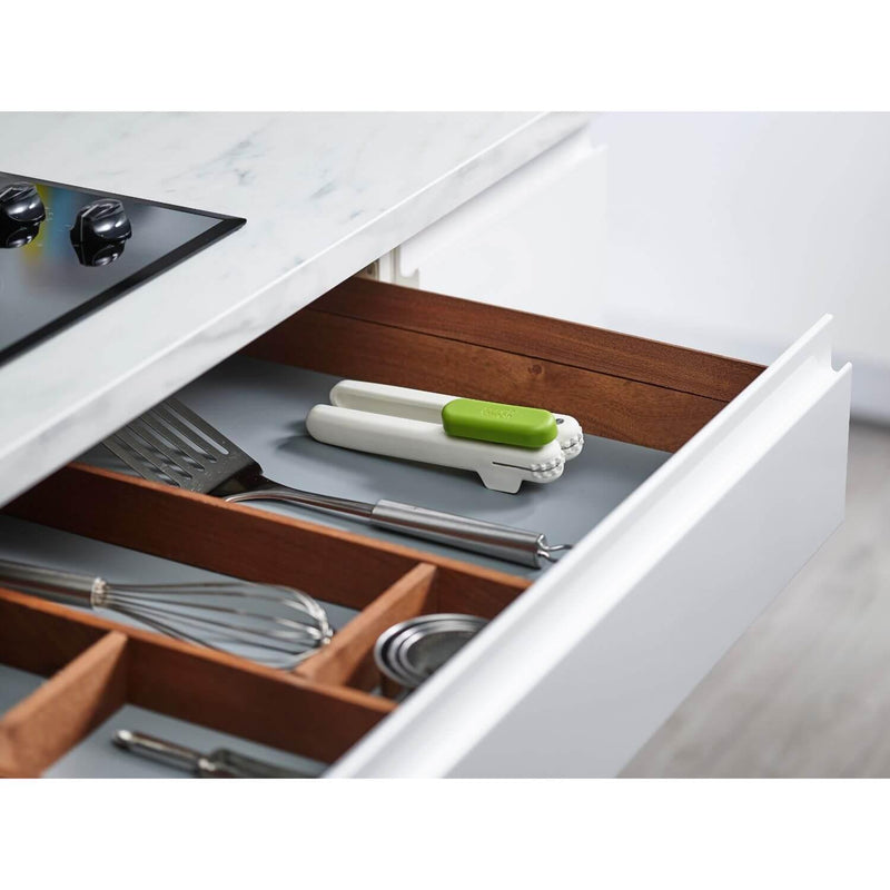 Joseph Joseph Pivot 3-In-1 Can Opener - Green and White - Compact Drawer Storage Lifestyle